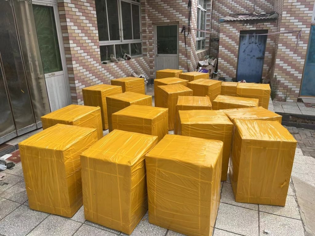 Bulk conference laptop bags packed in boxes for delivery